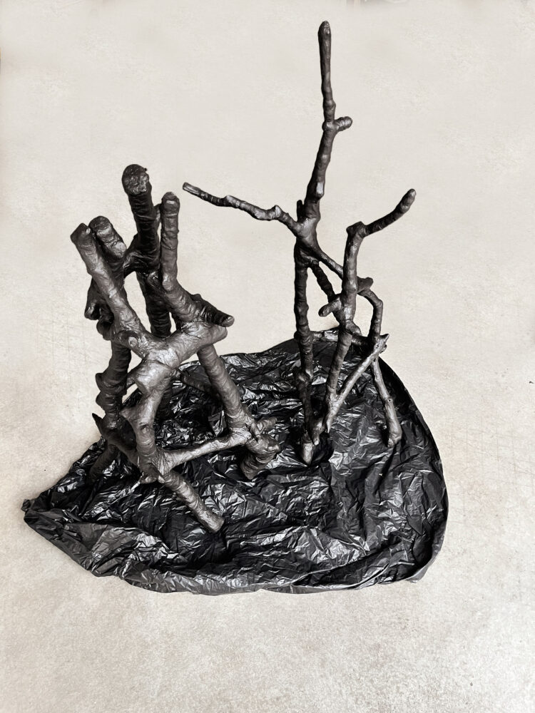 &raquo;Zwischen den Birken… 20 + 21&laquo;, birch branches, plaster, acrylics, garbage bag, 02<span class="slash">/</span>2026, hight 102 and 115 cm